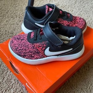 Ink and black Nike kids shoes